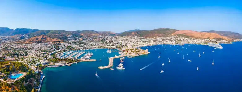Guests paddleboarding near gulet